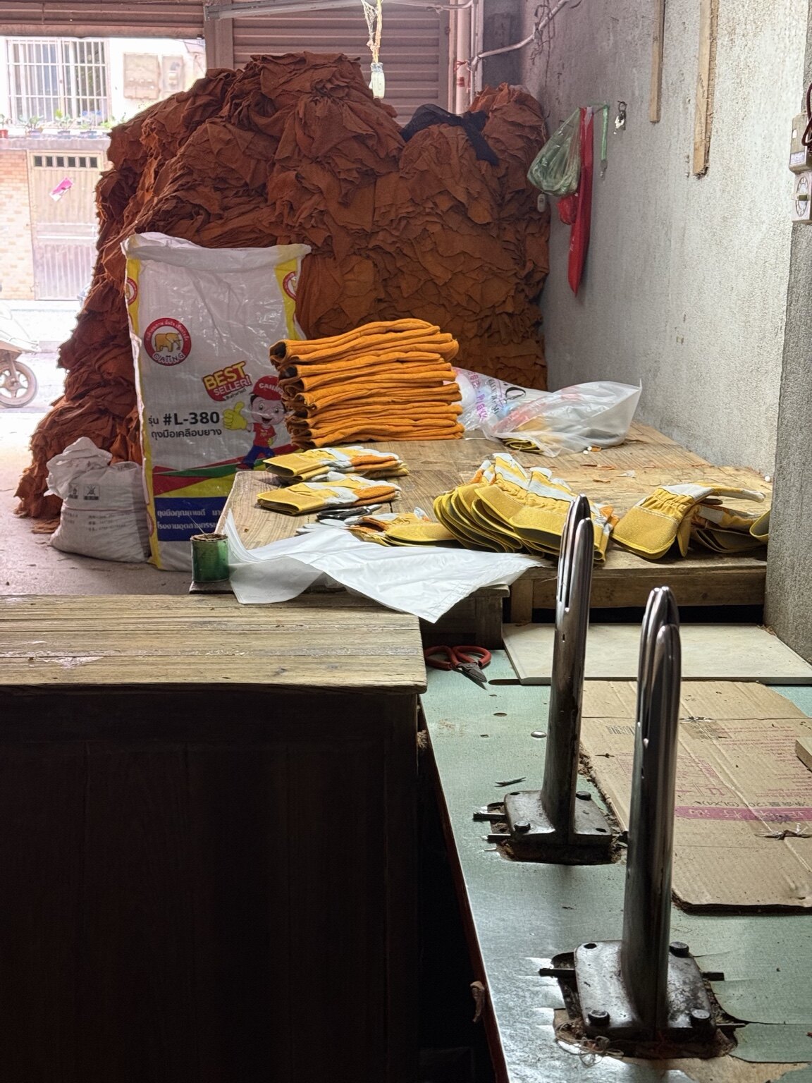 Finished gloves being paired and prepared for packing