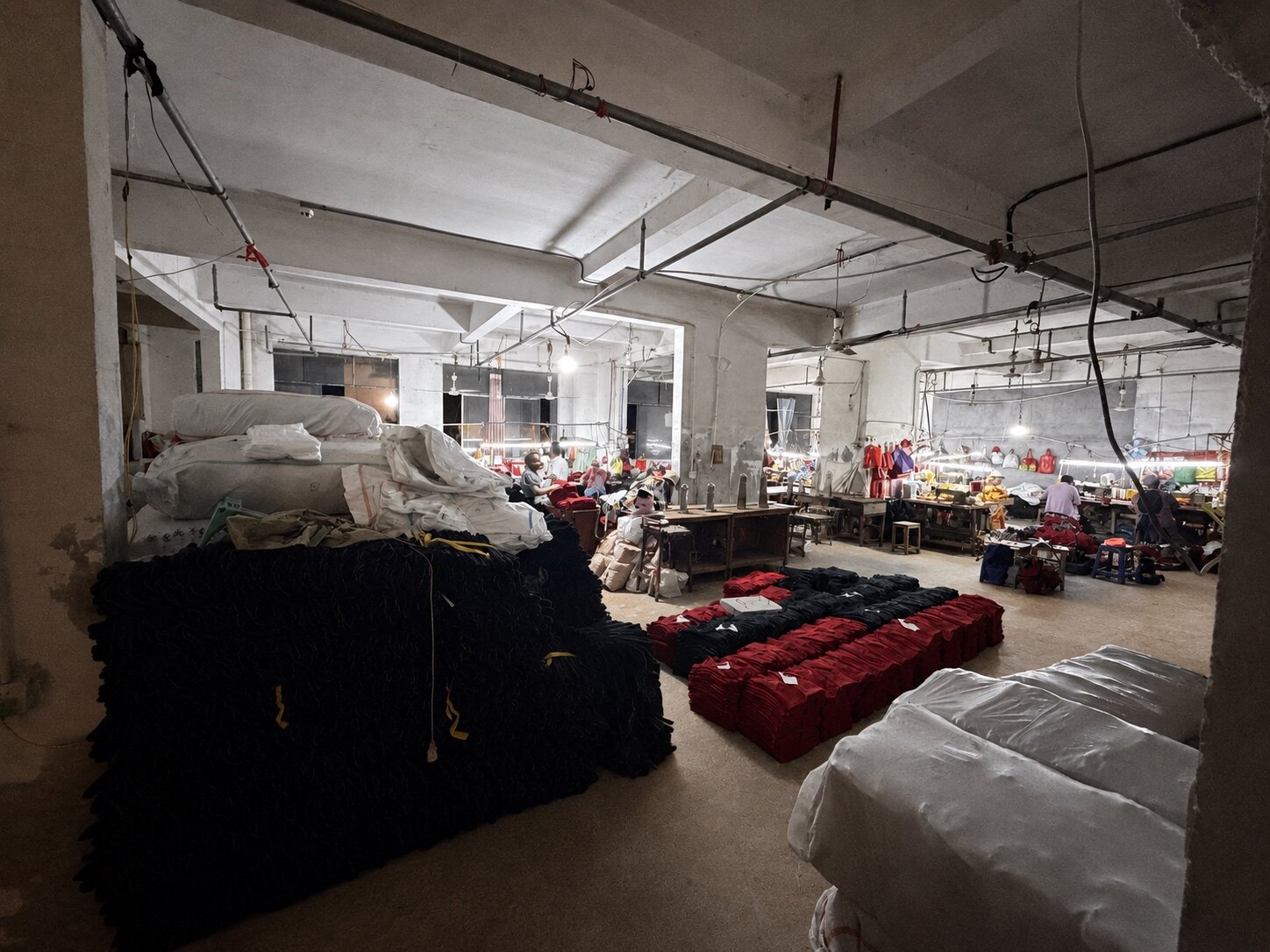 Prepared glove components arranged beside the production area