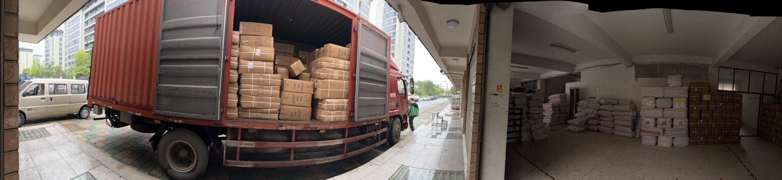 Finished cartons moving from warehouse storage to a delivery truck